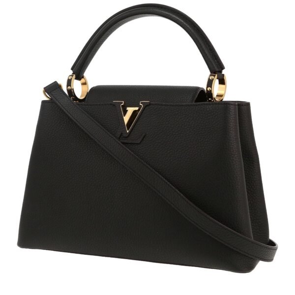 Louis Vuitton Capucines MM handbag in black leather taurillon clémence and pink piping