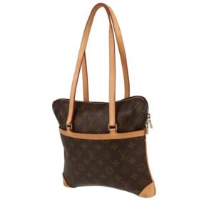 Louis Vuitton Coussin handbag monogram canvas and natural leather