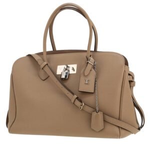 Louis Vuitton Milla handbag in taupe grained leather