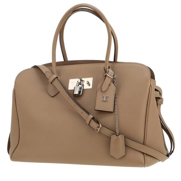Louis Vuitton Milla handbag in taupe grained leather