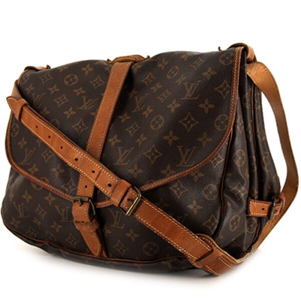 Louis Vuitton Saumur large model shoulder bag in brown monogram canvas and natural leather