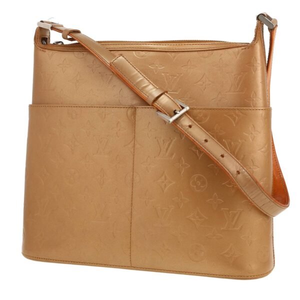 Louis Vuitton Sutter handbag in gold monogram leather